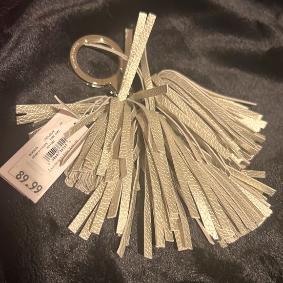 Kate Spade Gold Fringe Key Chain or Purse accessory bran new never used